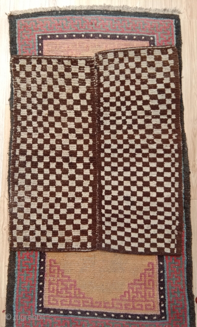 very rare checkerboard mat, truly nomadic piece made in 2 halves on a small narrow loom.. tibet 19th century              