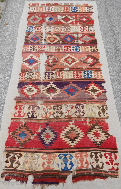 Early Central Anatolian banded "one-piece" kilim. Nearly complete. Conserved and mounted on linen. 18th c. or older. Sublime color.              