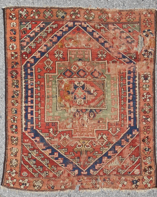 Mid 18th c. Anatolian Canakkale rug (46"x 57") Good village example with some old faded repair.                 