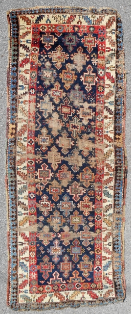 Early South Caucasian long rug. Compare with Rudnick rug (picture included) that sold for about $7500 at Grogan in Boston.             