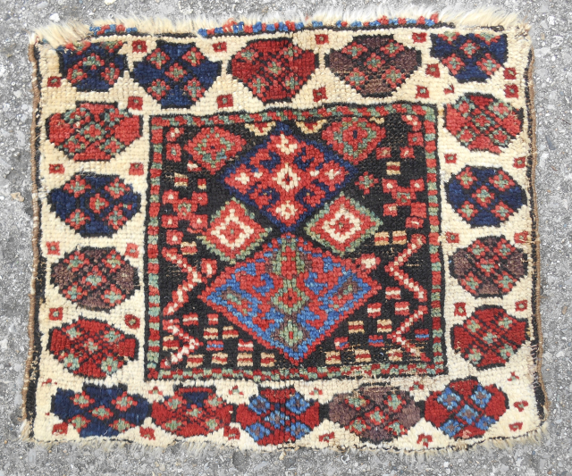 Circa 1870 Jaff Kurdish bagface. Large scale drawing. Bold white border. Luscious pile. Excellent color including a nice old purple. Please email: patrickpouler@gmail.com          