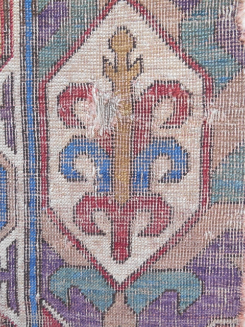 Small Caucasian Dragon carpet fragment (detail) with purple field. 17th C.                      