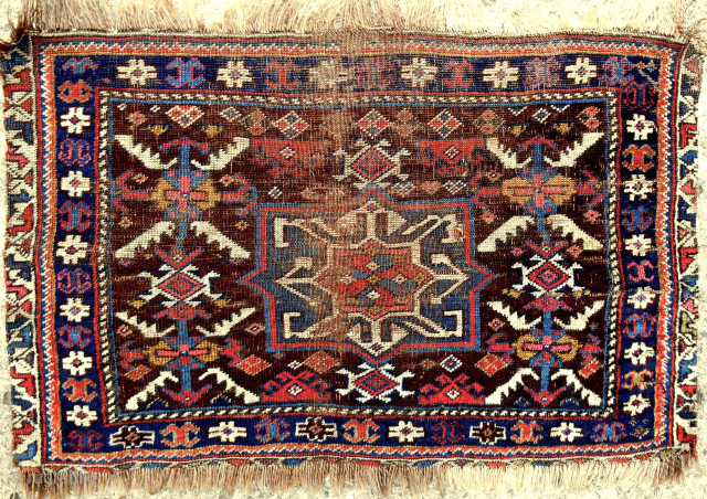 Early North Azerbaijan bagface. Circa 1840-60. Fine and thin like a cloth. Rare aubergine field color. See Rothberg’s great new book, Nomadic Visions, plate 64. Please email: patrickpouler@gmail.com     