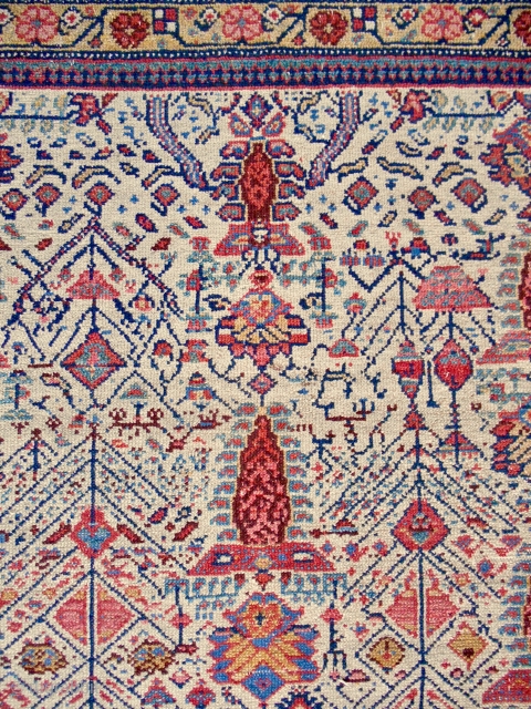 Refined white ground Persian Senneh garden rug (detail) 4 x 6 ft. Rare design with clear, sparkling color. Circa 1850.             