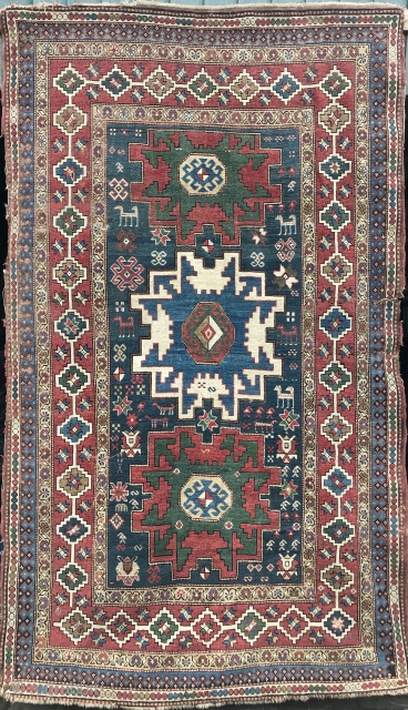 Nice Caucasian rug with Lesghi stars 1900-1910. Overall in reasonable condition, some wear, a few minor holes and tears. 
As found, in need of a wash. 
155x260 cm.     