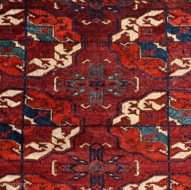 "The knowledge of which geometry aims is the knowledge of the eternal." Plato Turkmen Tekke main carpet, early to mid 1800's. Burning colors after 150-200 years .... More beauties: http://rugrabbit.com/profile/5160   