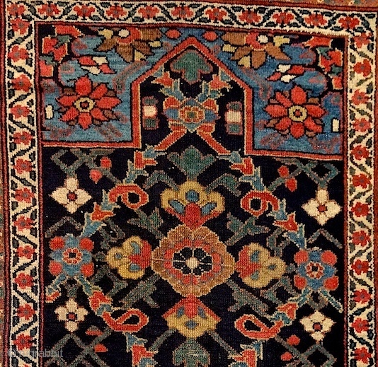 North-west persian kurdish 'double-mihrab' rug, 19th century. Non-commercial, tribal/village work with great colors & bold drawing. Ancient S-hooked border! Stylized dragons defending a blooming 'mina-khani' field of life. More pieces: http://rugrabbit.com/profile/5160  