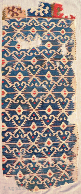 Anatolian kilim fragment, 170 x 67 cms, mounted on linen.
                       