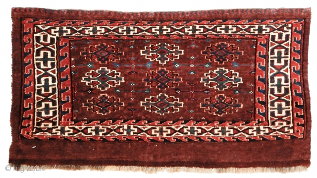 Yomut Torba, 2'3" x 1'3". Colors are vivid and natural using a classic Yomud burgundy red field. Collection of Dr. and Mrs. William T. Price. Inv# 17727.
      