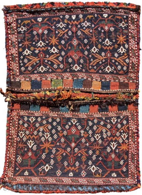 Bakhtiari sumak khorjin
size= 1'11" x 2'8" , rug# 19099 
Luri Bakhtiari bags are known for their distinctive integration of sumak and other flatweave techniques. This Luri Bakhtiari 'khorjin' double saddle bag makes  ...