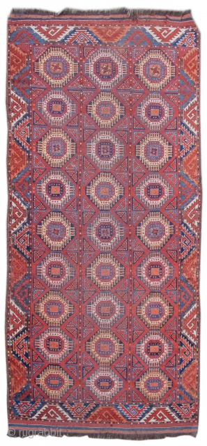 Central Asian Bashir type Middle Amu Darya area Turkmen rug with geometric design and curled-leaf border. Great color and wool. size= 3'10 x 8'6".Inv# 17868
        