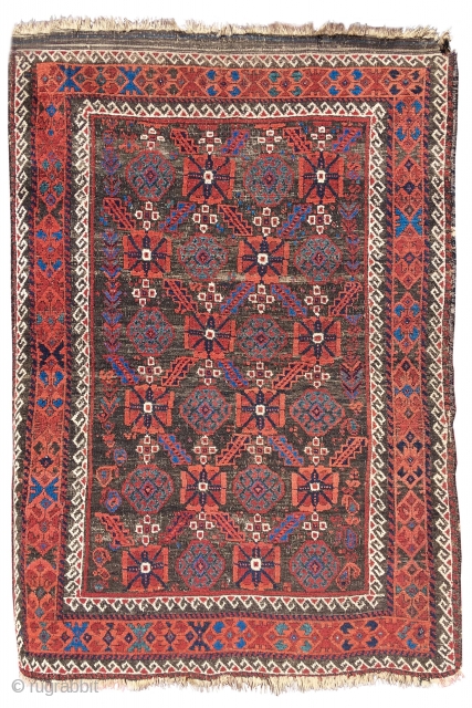 Baluch rug with a minakhani field. Arab Baluch type, Northest Persian. Rare design for this type. Glistening wool and natural color.
size is 3'7"x5'3"          