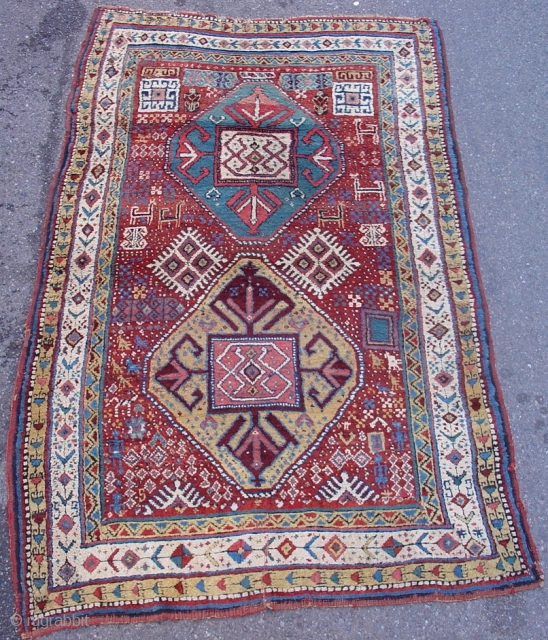 Kurd Rug, probably from Khorosan. Great wool and color with a regional adaptation of some familiar Kurdish drawing. Second Half of the 19th century (probably 3rd quarter). This piece has been cut  ...