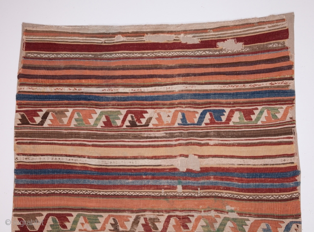 Central Anatolian kilim. Mid 19th century (?). Beautiful, soft pastel colors. Expertly backed with a high quality linen. Ready for display or even use. It has a soft presence.  317x140cms  