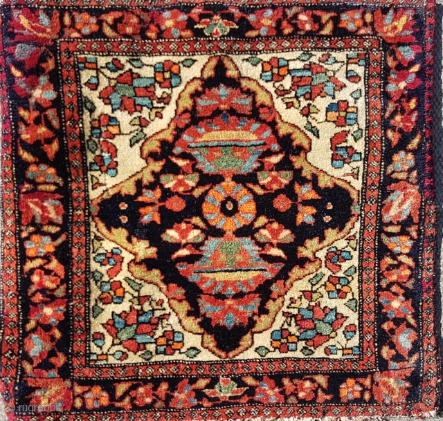 This is a very small  Sarouq Farahan  sampler rug (Vegiereh) showing parts of the design available to a prospective rug buyer or as a weaver's guide 
This small sampler shows  ...