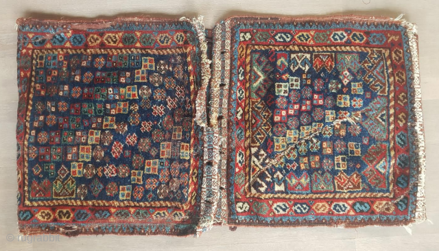 Antique SW Persian (Luri?) khorjin, 55 x 110 cm.  or 209 x 55 cm. fully open...
Interesting and unusual all over design.
Super saturated colors, partially full pile, wear, creases and damages but  ...