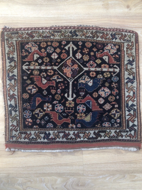 A very nice Qashghayi bag face with birds about 100 years old,50x58 cm,in a good condition,a collectable piece.pls not to hesitate to ask me any question about this beautifull piece.   