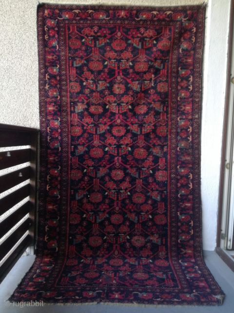 A very old uncommon Iran Hamadan rug. Very light and thin. On wool frings and cotton wefts. Even wear with about three or four repairs. 

230/115 cm.      