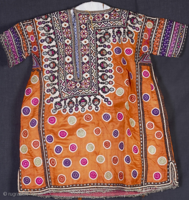  CHILD DRESS •

Undying and Incomparable Culture of Sindh, Fascinating Elegance of Patterns .

Sindh, Pakistan, mid 20th- century

This Hand embroidered designs and motifs are flat and marvellous worked on one or two  ...