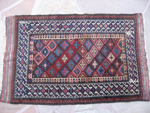 Kuchan Kurd rug 3'10" x 2'8"
Late 19th Century
Beautiful rug in good condition.  Corroded browns.  At least one chemical color.            