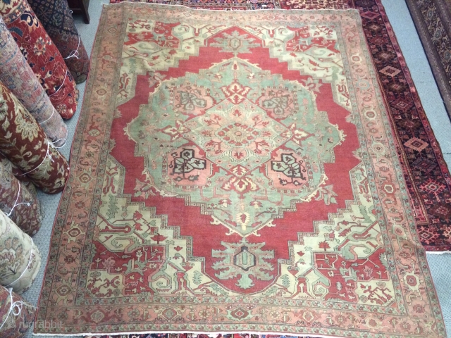 This is an antique Serapi or a Bakhshaish rug that was hand knotted pre-1900s. The rug has been restored to its old glory. I have uploaded the picture of back of the  ...