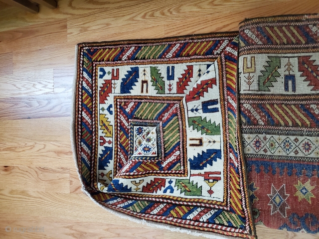 Older SE Caucasian long rug,very fine weave ,colors and drawing. 14 count em' 14 major and minor borders . Has some old repairs as expected ca 1880,intact and collectible , 
43"x93"
  