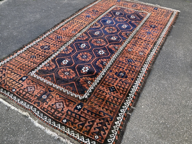 180 x 104 cm  antique baluch with mina khani design, corroded areas, overall good condition                 