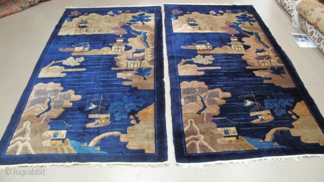 A pair of c. 1930 Chinese pictorial rugs ( 3.11 x 7.8 and 4.1 x 7.7). Each has full, silky wool pile. One of the pair has some patches on the back  ...