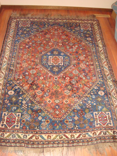 KAMSEH'S TRIBAL RUG: The rug is dated approximately 1930. The dyes appear to be entirely natural. This tribal rug is Kamsehs and not Qashqa’is as originally thought. The weft is wool and  ...