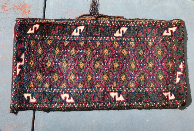 Baluch balisht pillow bag, early 20C and in m.i.n.t. condition!

Measuring 78x40cm, this striking bag has full pile with natural dyes and soft wool. Kilim ends and original back. Goathair selvedge and handle.  ...