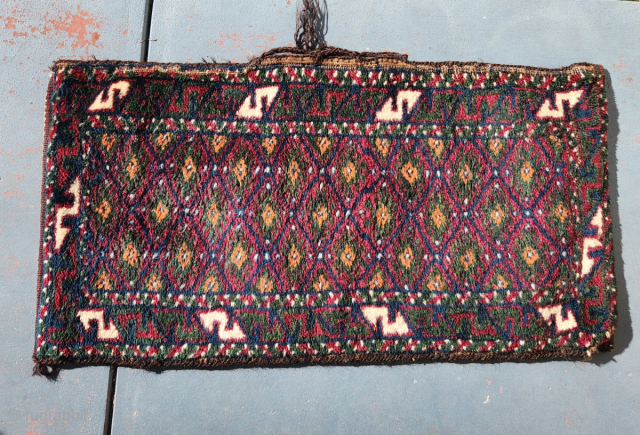 Baluch balisht pillow bag, early 20c and in m.i.n.t. condition! 

Measuring 78x40cm, this striking bag has full pile with natural dyes and soft wool. Kilim ends and original back. Goathair selvedge and  ...