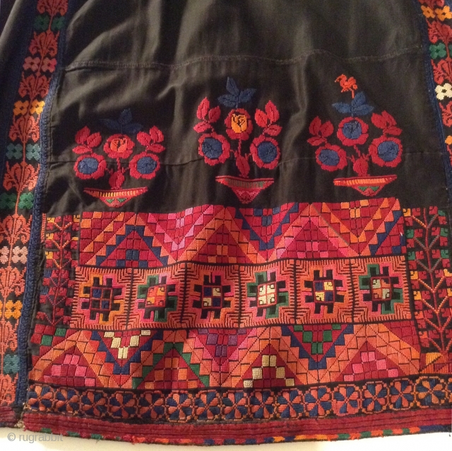 This was originally a Palestinian dress, but was made into a skirt. (Not by me). The top may have been damaged or worn.  The embroidery is beautiful and in perfect condition. 