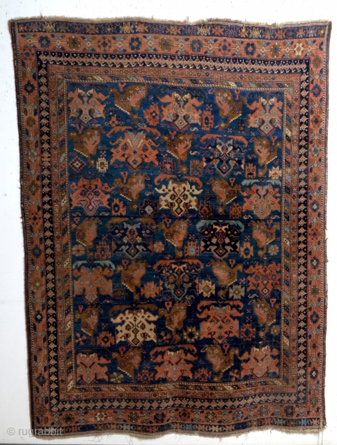 Antique Afshar with mythological roosters and deamon's head figuration. 
Natural colors. 
Early 20th century. 
Size: 191 x 143 Cm's.              