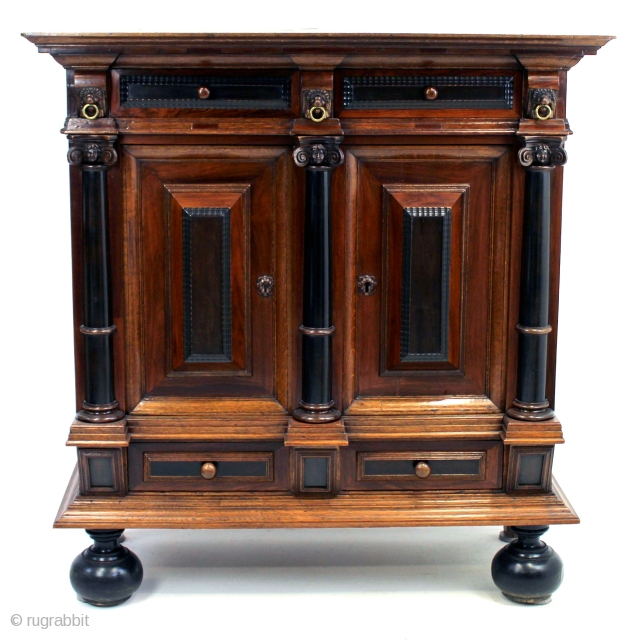 Fine Dutch baroque cabinet, 1650. 
Oak, ebony and rosewood. 
High 151 Cm.   5 feet 
Wide 147 Cm.  4.9 feet. 
The hood can be removed. 



suitable for air cargo.  
