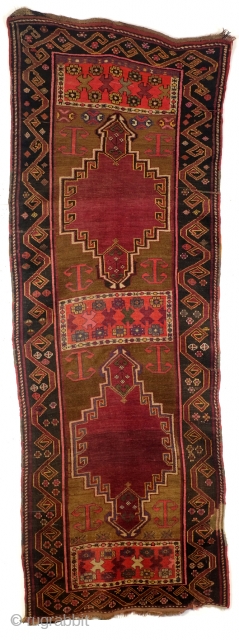 Dagestan, N- Caucasus, 300 x 106 cm. 10 ft. x 3.5 ft. 
Camel field made of camel wool. 
Dragon border. Beautiful abrash. 
Ornament: Banus oiuv means barrel. 
Loved motif of the Kumyken  ...