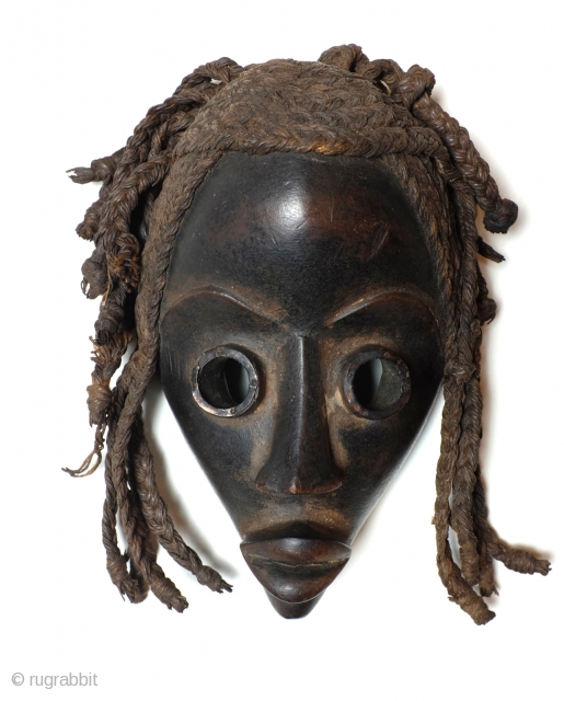 Dan mask, Gunye GE, Ivory Coast, high 23 Cm. wide 14 Cm. 
Provenance, ex collection Heinrich Goertz, autor of several books. 
Signens Kunstauktionen. Now Dutch collection.       