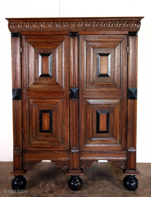 Dutch neo - classical kast. Around 1775 - 1785. 
Oak and rosewood with a great patine. 
In great condition. Original. 
Hight 172 Cm's 5 feet 12 inch. wide 132 Cm's.  4  ...