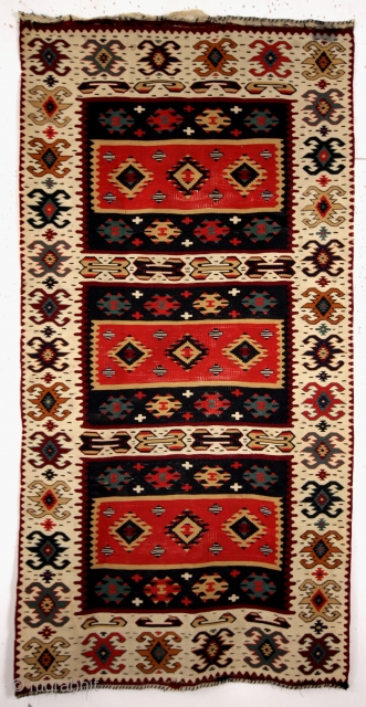 sarkoy kilim, Tracian, Greek/Macedonian area. Late 19th begin 20th century. 
The right red. No bleeding. The headings were folded and a fabrick was stitched around.
Ugly, I took it away. Headings still folded,  ...