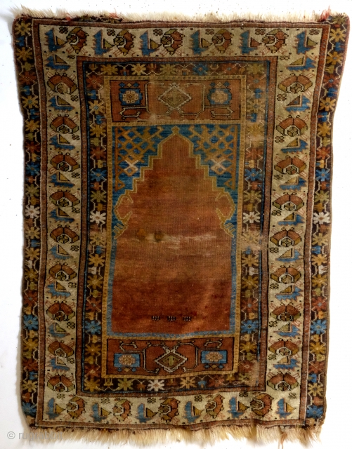 prayer rug from Karapinar, Konya area. 
Late 19th century, worn in worship, as is. 
Natural colors. 

144 x 104 Cm. 
            