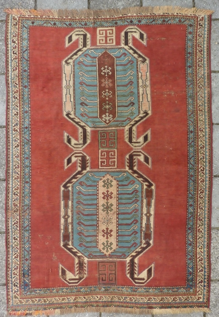 Caucasian Lenkoran, end of 19th cent., 170 x 118 cm.
Missing outer guard border; natural dyes and a faded pinkish red.             