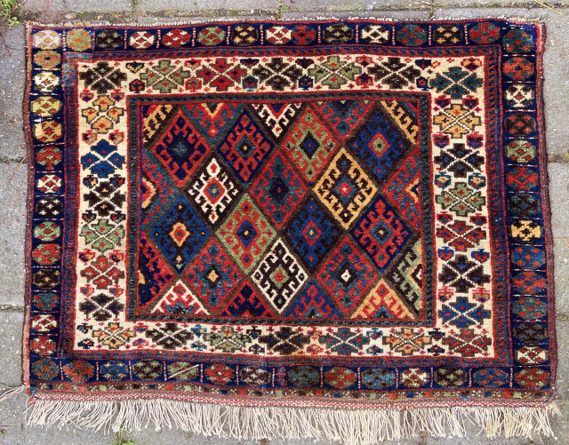 Antique Big Jaf Kurdish bag front, 105 x 78 cm. Full meaty pile all over and with a nice range of all natural dyes. Two corners with repairs, a small one and  ...