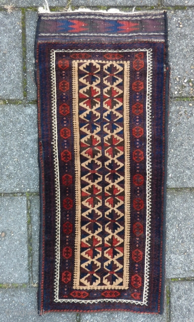 Strong Baluch balisht with kilim back, 99  x 42 cm., 39" x 17". Good condition and pile. All natural dyes except for the three repeating dots in the main border (  ...