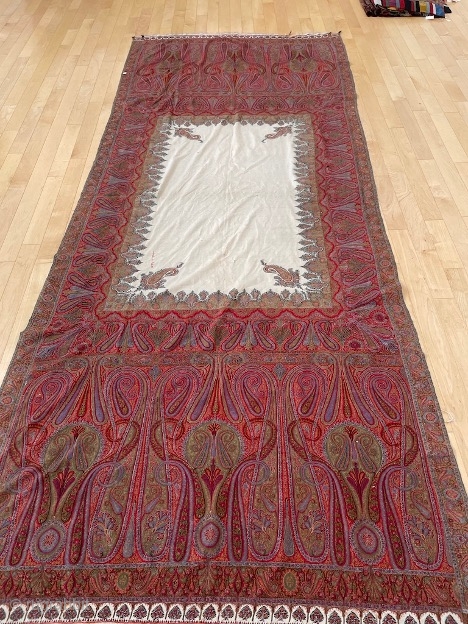 4’7” x 11’2”  / 137cm x 480cm. Kashmir shawl, twill tapestry, pieced construction, embroidered lappets, good.                