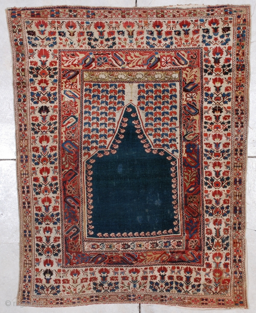 #6952 Ghiordes Antique Turkish Rug 4’2″ X 5’4″This late 17th century to early 18th century Ghiordes measures 4’2″ x 5’4″.
https://antiqueorientalrugs.com/product/6952-ghiordes-antique-turkish-rug/             