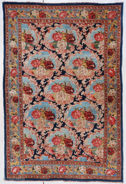 This circa 1910 antique Bidjar Oriental Rug measures 4’4” X 6’6”. This is a very lovely French design antique Bidjar. The roses, which are typical in this type of Bidjar, are contained  ...