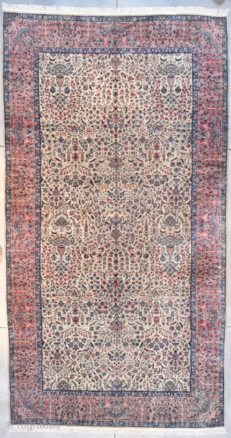 This circa 1920 Laver Kerman Oriental Rug measures 10’0” X 18’6” (304 x 570 cm). This is an absolutely fabulous Laver Kerman in a giant palace size. It has a floral overall  ...