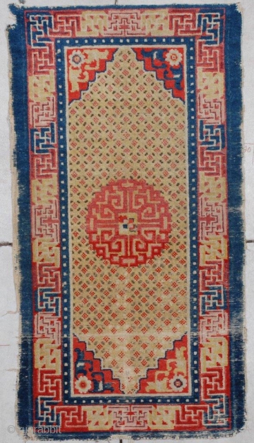 #7140 Antique Ningxia Rug 
This Ningxia measures 2’4” x 4’0”. It has a center medallion in pale red with corners worked in two colors of red with floral motifs on a pale  ...