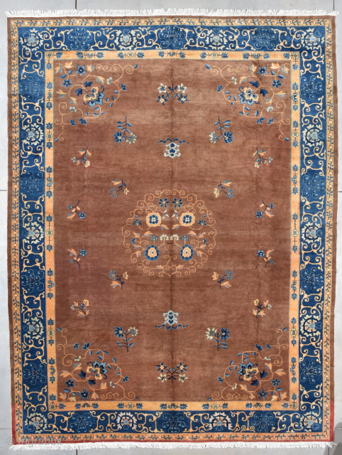 OVERSIZED This last quarter 19th century Peking Chinese Oriental Rug #7812 measures 10’1 X 13’6” (308 x 515 cm). It has a medium brown field ala milk chocolate and a medallion with  ...