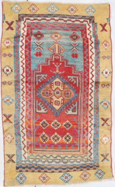 #7399 Konya This very antique possibly circa 18c? Konya measures 3’11” x 4’10” (120 x 150 cm). This rug is all things Konya. It has a Turkish madder red field with prayer  ...