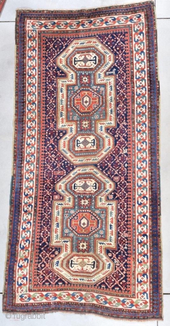 #7732 Kazak Antique Caucasian Oriental Rug 
This second half 19th century Kazak antique rug measures 4’3” X 9’0” (131 x 274 cm). It has a double keyhole design. It is in full  ...